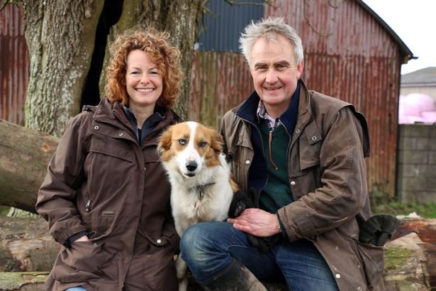 Kate Humble, her dog Teg and her husband Ludo Graham in Kate Humble: My Sheepdog & Me at their farm in Wales