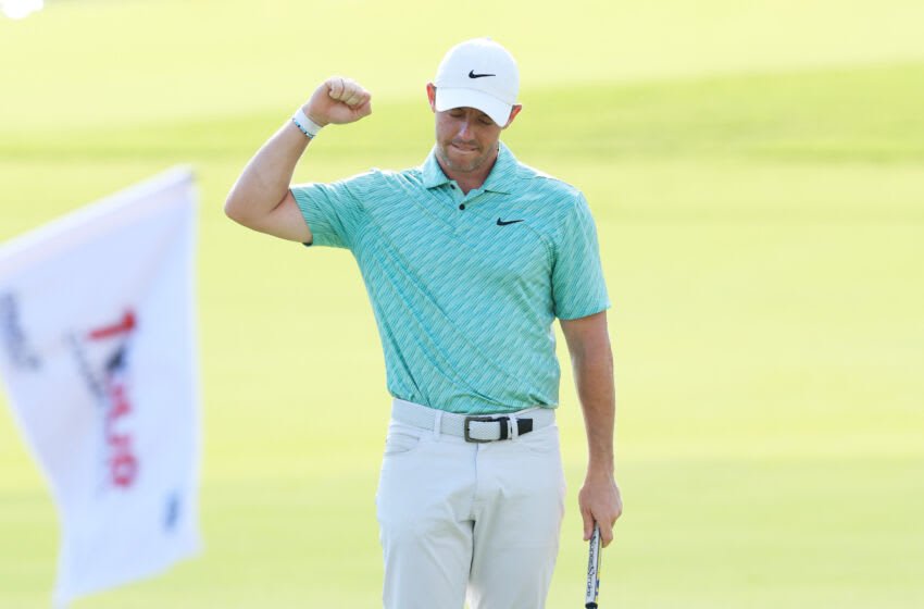 ATLANTA, GEORGIA - AUGUST 28: Rory McIlroy of Northern Ireland celebrates on the 18th green after winning during the final round of the TOUR Championship at East Lake Golf Club on August 28, 2022 in Atlanta, Georgia. (Photo by Sam Greenwood/Getty Images)