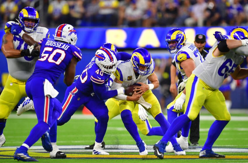 Sep 8, 2022; Inglewood, California, USA; Los Angeles Rams quarterback Matthew Stafford (9) is brought down by Buffalo Bills linebacker Von Miller (40) in the third quarter at SoFi Stadium. Mandatory Credit: Gary A. Vasquez-USA TODAY Sports