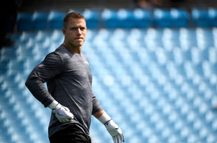 CHARLOTTE, NORTH CAROLINA - SEPTEMBER 19: Running Back Christian McCaffrey #22 of the Carolina Panthers during pregame wram-ups in the game against the New Orleans Saints at Bank of America Stadium on September 19, 2021 in Charlotte, North Carolina. (Photo by Mike Comer/Getty Images)