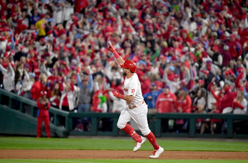 Oct 22, 2022; Philadelphia, Pennsylvania, USA; Philadelphia Phillies left fielder Kyle Schwarber (12) gestures while running the bases after his home run in the sixth inning during game four of the NLCS against the San Diego Padres for the 2022 MLB Playoffs at Citizens Bank Park. Mandatory Credit: Eric Hartline-USA TODAY Sports